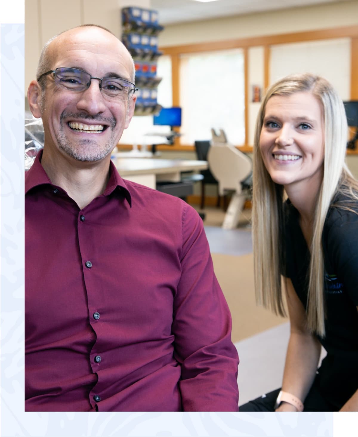adult patient and team member smiling